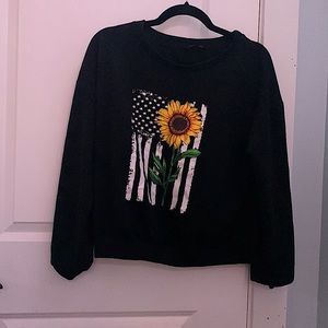 A light sweatshirt with an American flag and sunflower!